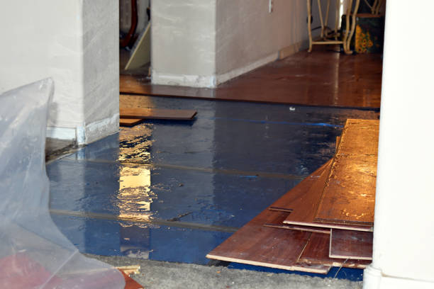 Professional Flood Cleanup technician working in Crosby, ND